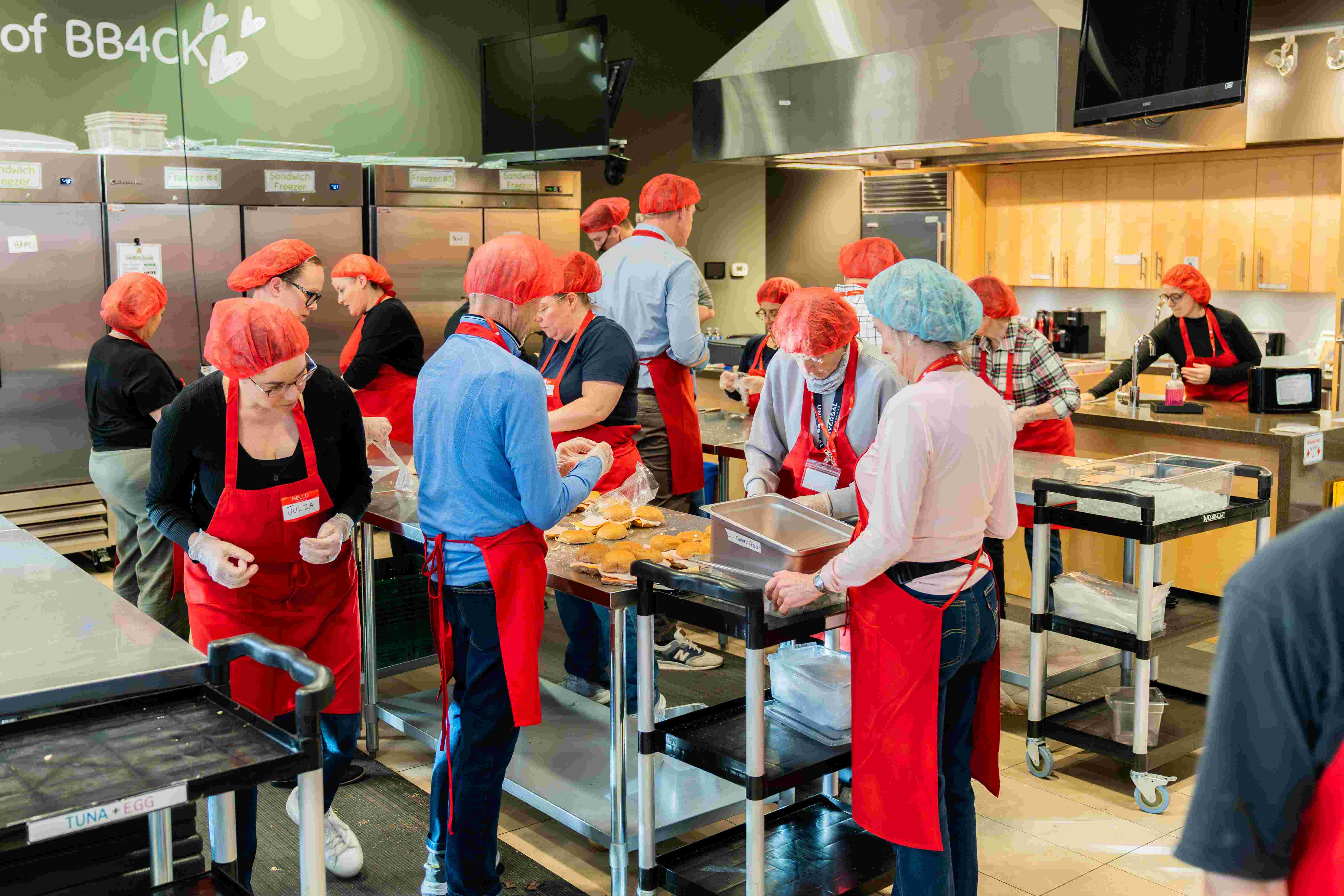 a team working together in a commericial kitchen space